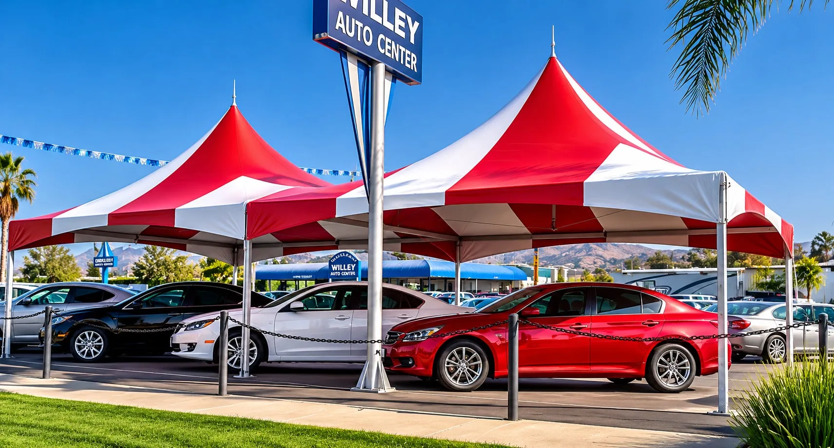 Red and white peaked canopies over a car dealership forecourt.